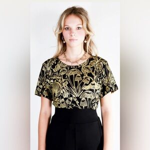 Gold on black shroomed Amie tee